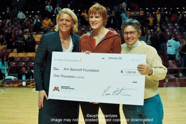 bancroft borton copyright 2013 sophia hantzes all rights reserved Coach Pam Borton made a $1000 donation to the Ann Bancroft Foundation at the Minnesota Gopher vs Nebraska Cornhuskers "Burst the Barn" night at Williams Arena.
Pictured l-r
Pam Borton
Coach, Women's Basketball U of M
Joanne Grobe
Ann Bancroft Foundation
Ann Bancroft
Ann Bancroft Foundation