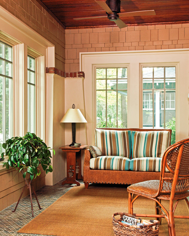 The porch accommodates a seating area as well as informal dining that Mark loves to use for his studies.