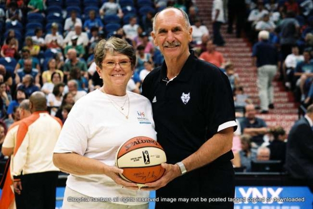 lynx rhi 01 copyright 2013 sophai hantzes all rights reserved Joann Usher, Executive Director of Rainbow Health Initiative was acknowledged by Chris Wright , President of the Minnesota Timberwolves at the Minnesota Lynx v Seattle Storm game at the Target Center. The Lynx won the game 97-74.