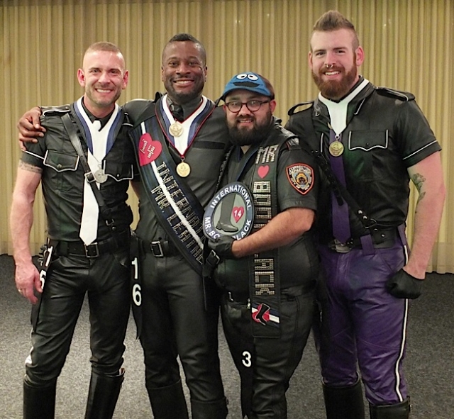 Left to right: IML first runner-up Steve Dupont; International Mr. Leather 2014 Ramien Pierre; International Mr. Bootblack 2014 Scout; and IML second runner-up Cody Troy. Photo by Steve Lenius.