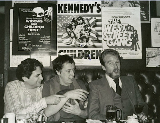 Gay playwrights Harvey Fierstein, Robert Patrick and Doric Wilson under their posters in Phebes Bar, NYC, 1980.