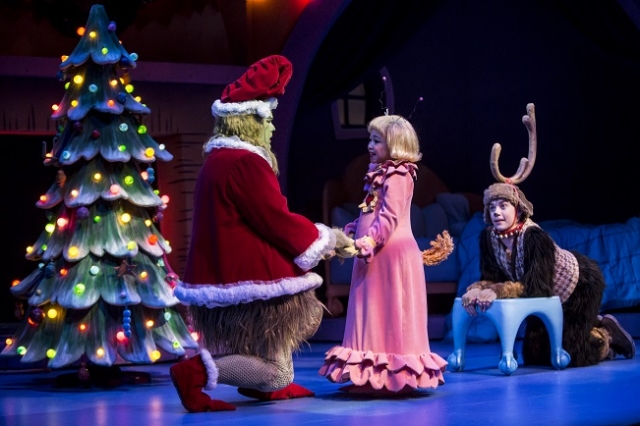 Max (Brandon Brooks) and the Grinch (Reed Sigmund) comfort Cindy Lou Who (Natalie Tran) Photo by Dan Norman