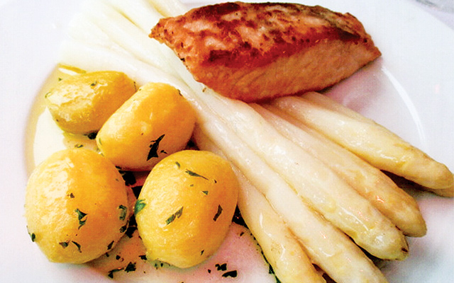 The famous white asparagus, here served with potatoes and salmon, Steigenberger Hotel. Photo by Carla Waldemar