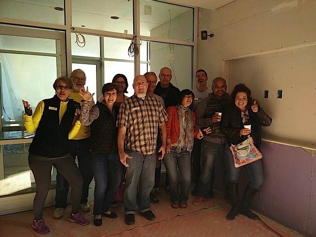 Supporters and staff clown around on a "Hard Hat" tour of Clare Terrace. The Robbinsdale community has been very welcoming. Photo courtesy of Clare Housing.