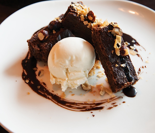 Chocolate brownie with ice cream and cocoa sauce; and cocktails called the St. Paul Sour with rye, red wine, lemon, egg white, and amaro.