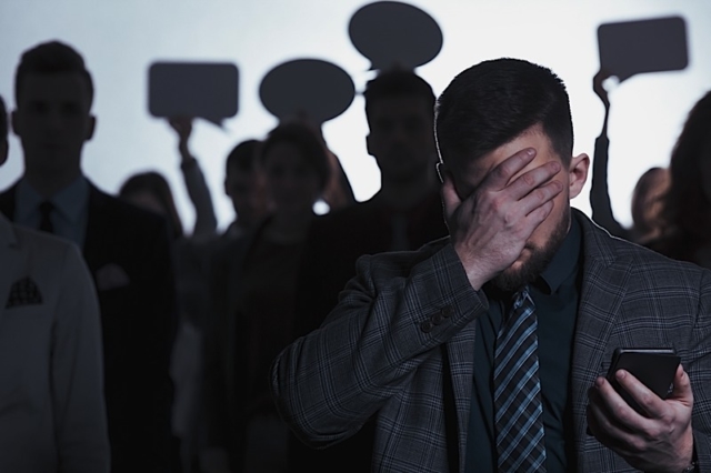 Man Covering His Face Photo courtesy of BigStock/Kasia Bialasiewicz