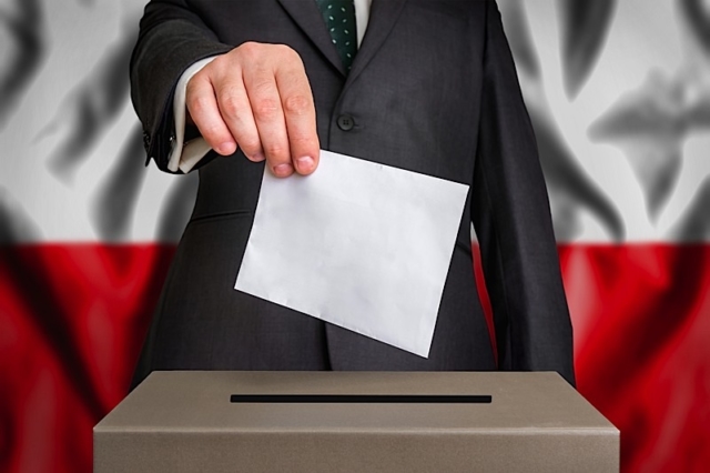 Election In Poland - Voting At The Ballot Box Photo courtesy of BigStock/andrianocz