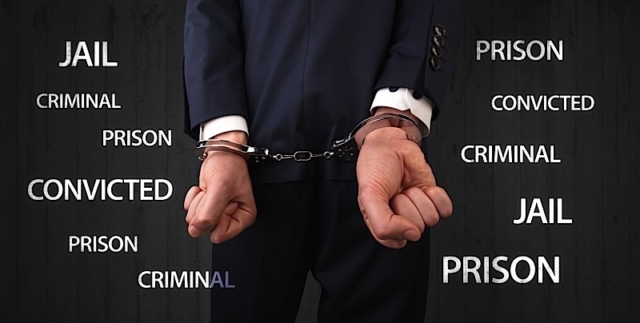 Jail convicted prison criminal labels with close handcuffed man Photo courtesy of BigStock/ra2studio