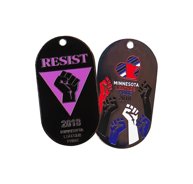 601LENIUS_2018_MNLP_Dog_Tag This year’s Minnesota Leather Pride dog tag was designed by Kurt
Patton, who was inspired by a symbol created by his partner, Steven Patton. Dog tags
are available for $10 at Twin Cities Leather & Latte, or from MNLP board members at
this year’s Minnesota Leather Pride events.
Photo by Andrew Bertke.