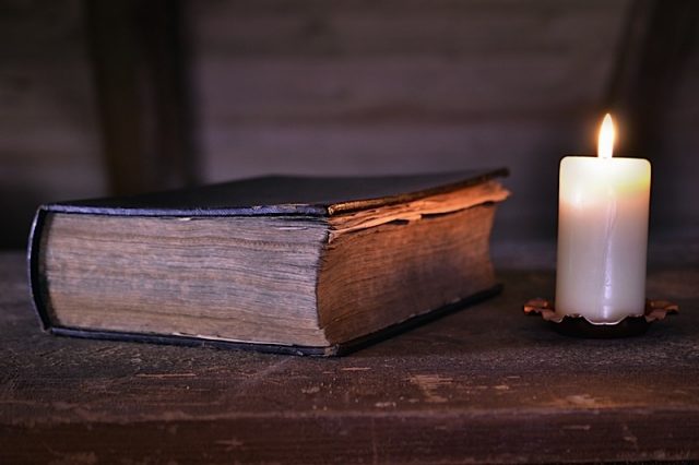 Storybook Candle Book Diary Magic Book Old History Photo courtesy of BigStock/sunnychicka