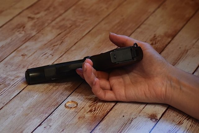 On The Verge Of Suicide. Shoot A Gun In The Head. Killing Yourself With Gun. Bringing To Suicide. Photo courtesy of BigStock/VictoriaDunn