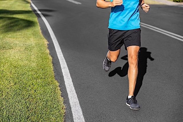 Runner Male Training Highway Road Photo courtesy of BigStock/Maridav