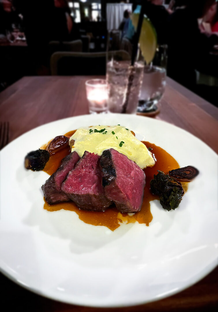 Plate with sakura wagyu culotte steak and mashed potatoes.