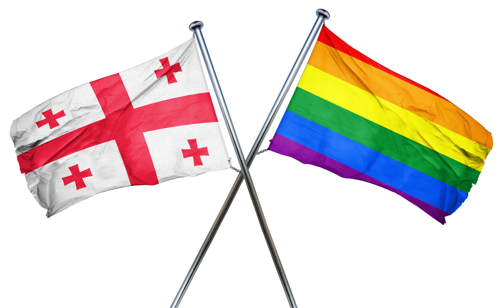Flag of the country of Georgia along with rainbow flag.