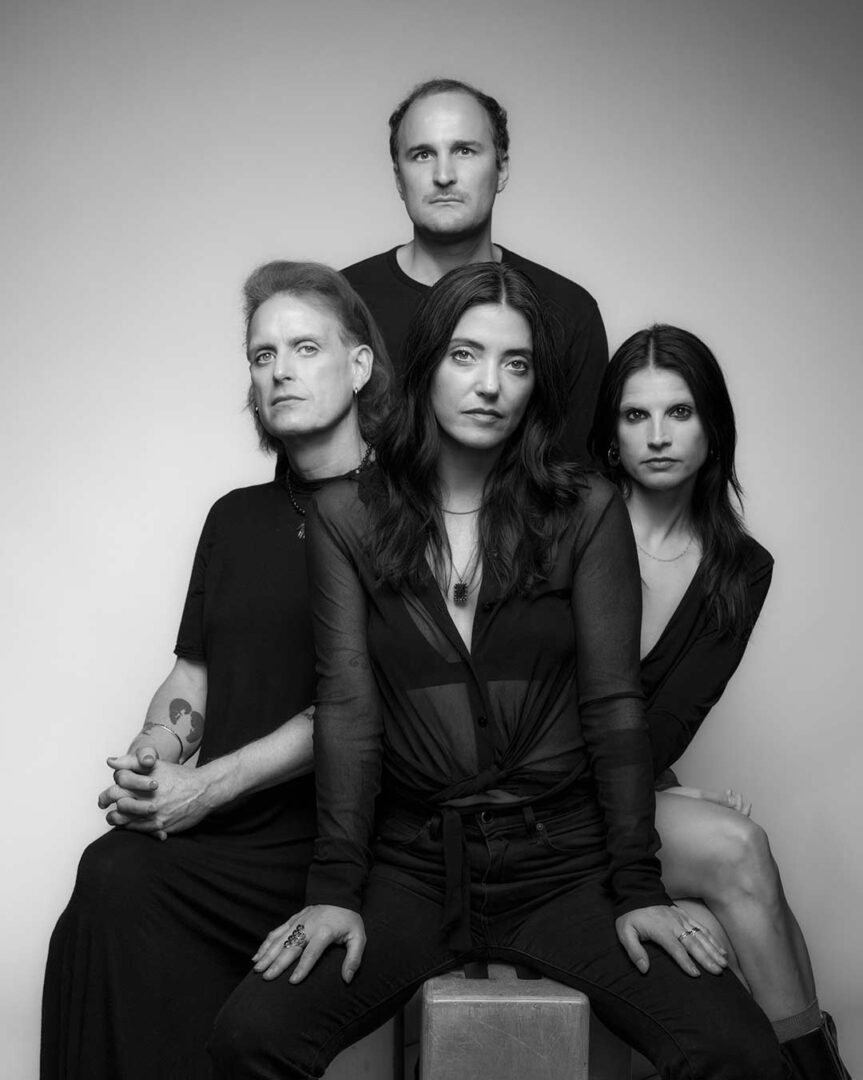 Group photo of the musical artists of Sharon Van Etten & The Attachment Theory.