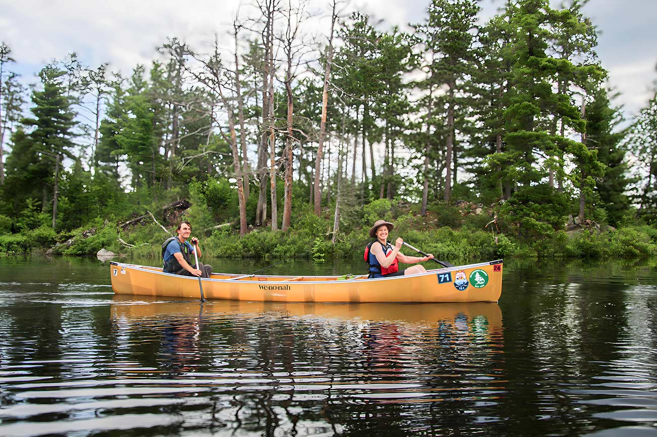 Two people canoe in the Boundary Waters.