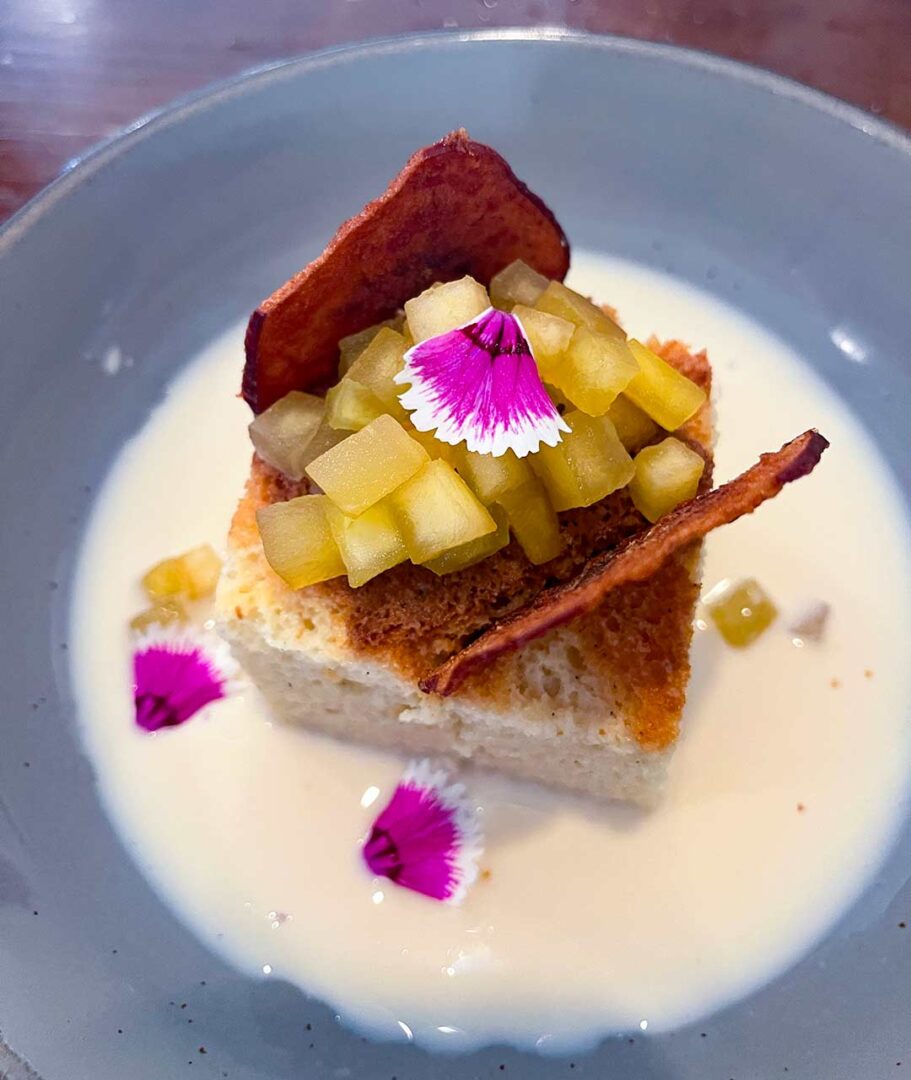 Bowl with a piece of Tres Leches.