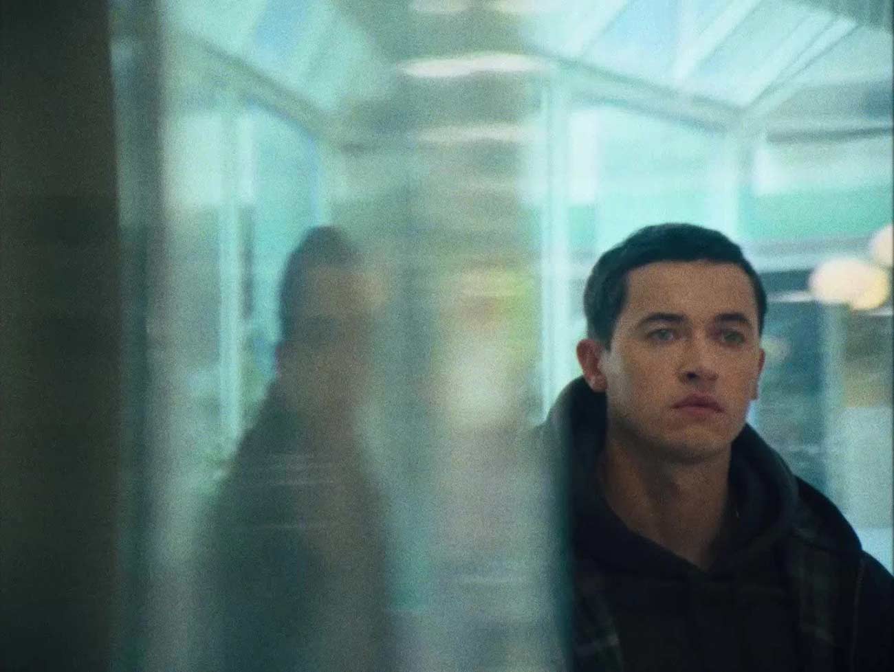 Production still of actor Tom Blyth in Plainclothes.