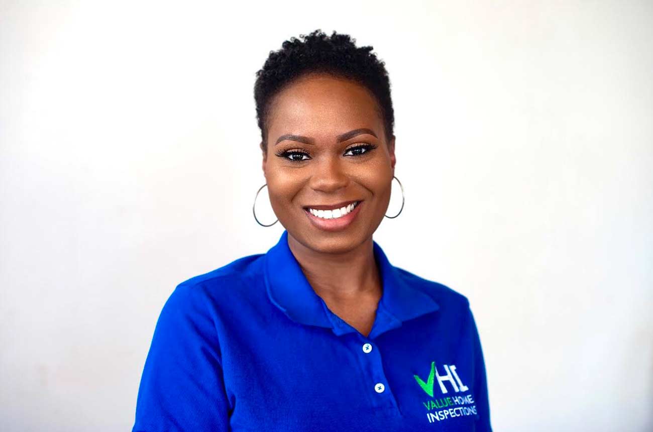 Headshot Value Home Inspections owner Emerald Sawyer.