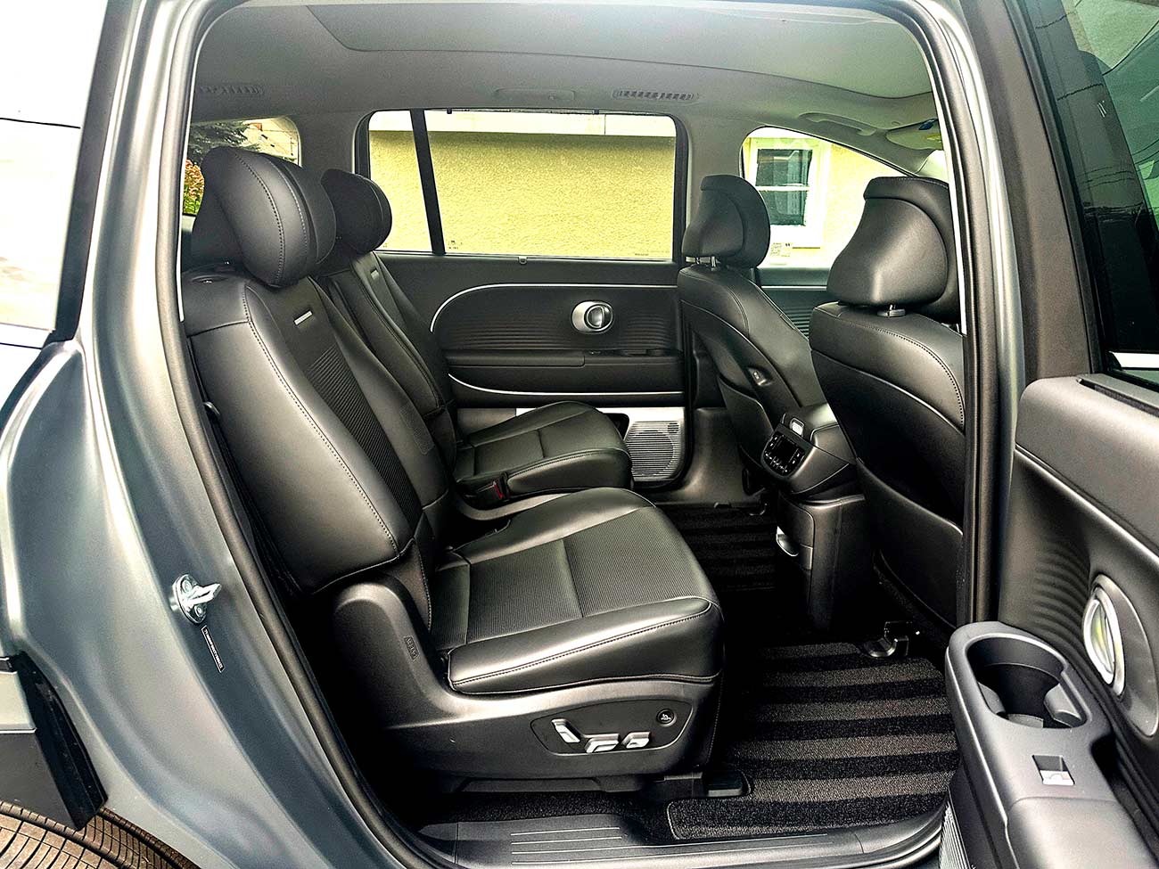 View of the leather seats in the rear of the vehicle.