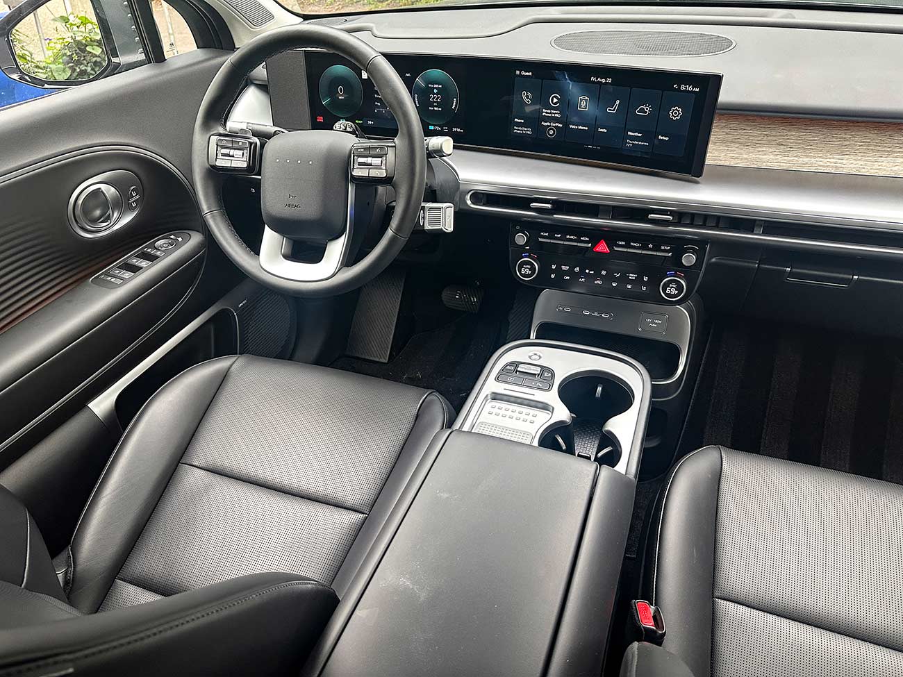 Steering wheel, cup holders, and the computerized dash console.