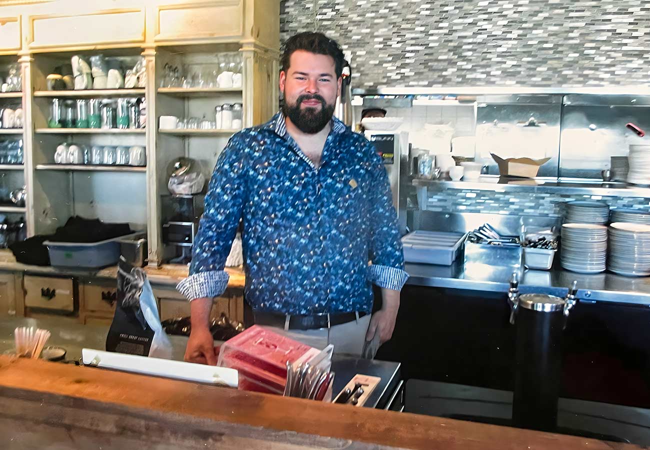 Candid shot of Jay Lekopoy, owner of Promenade Brasserie.