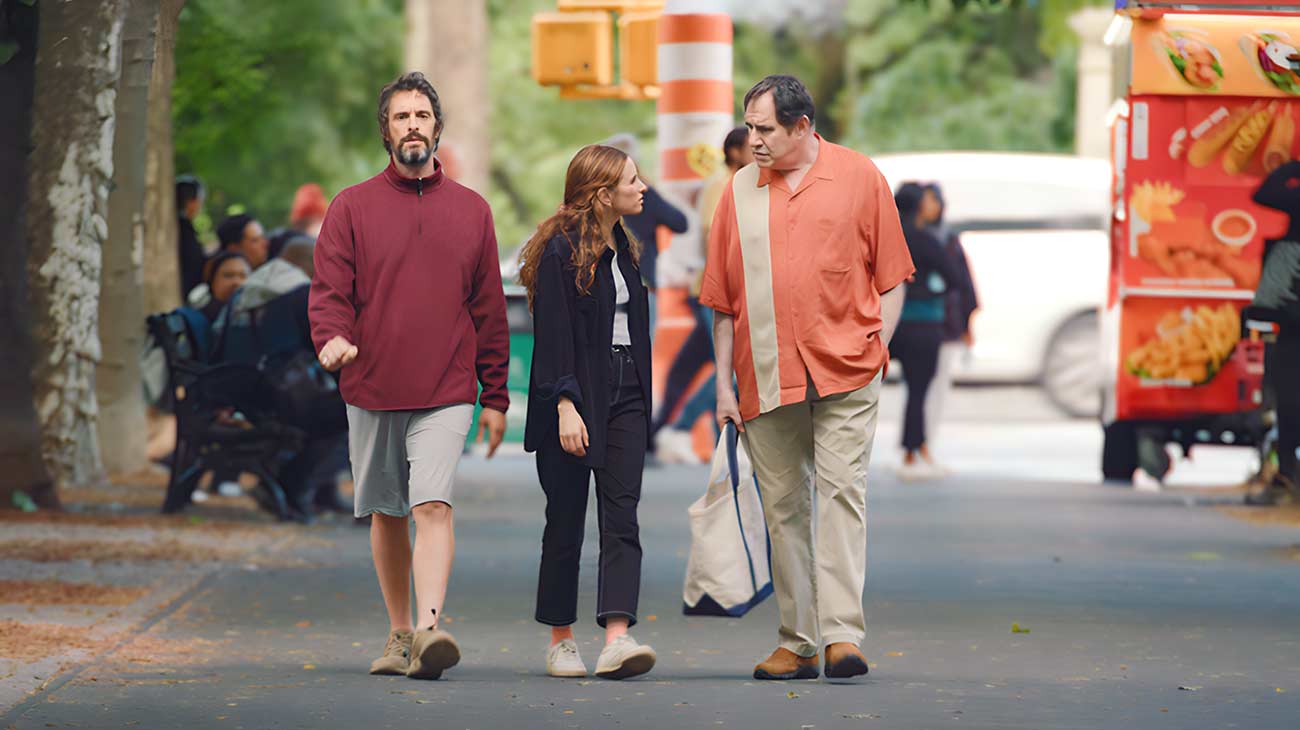 Production still of three actors walking on the street in the film Proof of Concept.