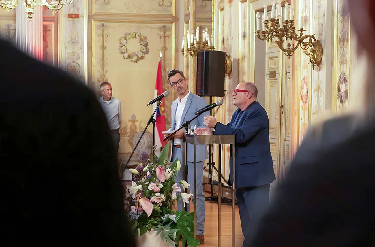Mark Segal speaking at a Palace reception.
