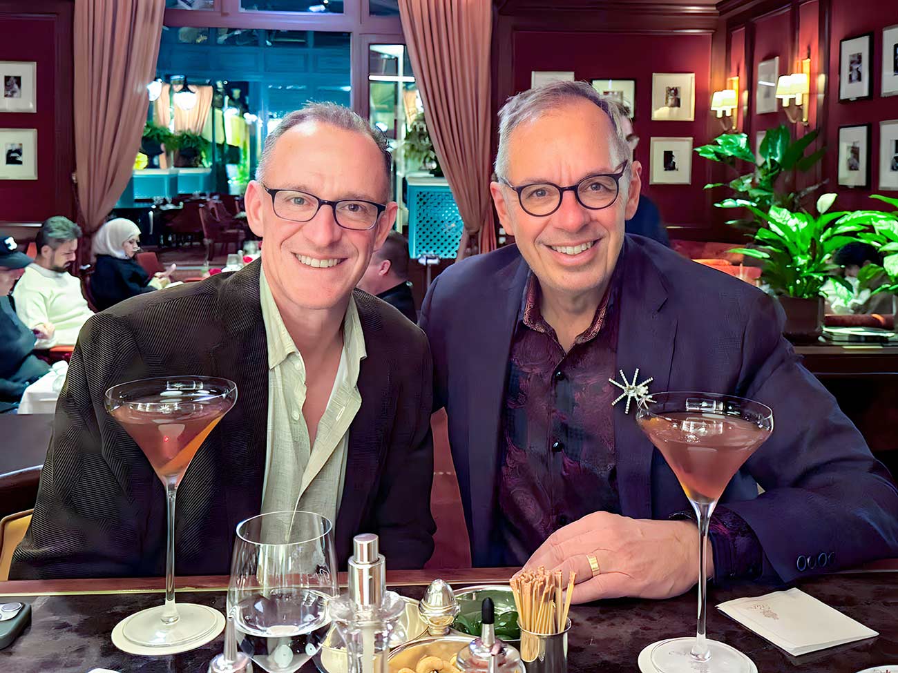 Mark Sullivan and Jim St. George at a nice dinner with cocktails.
