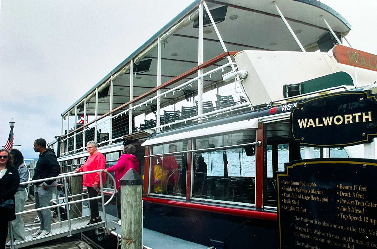 People getting off a boat of from the US Mailboat Tour.