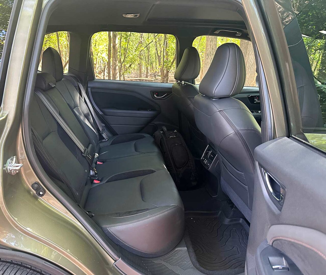 Interior shot of the leather seats in the 2025 Subaru Firester Touring Hybrid.