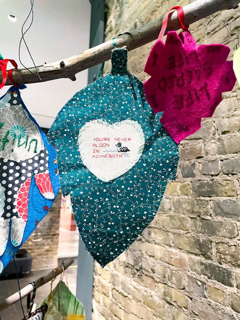 Loon leaf made of patterned cloth on the Tree of Peace.