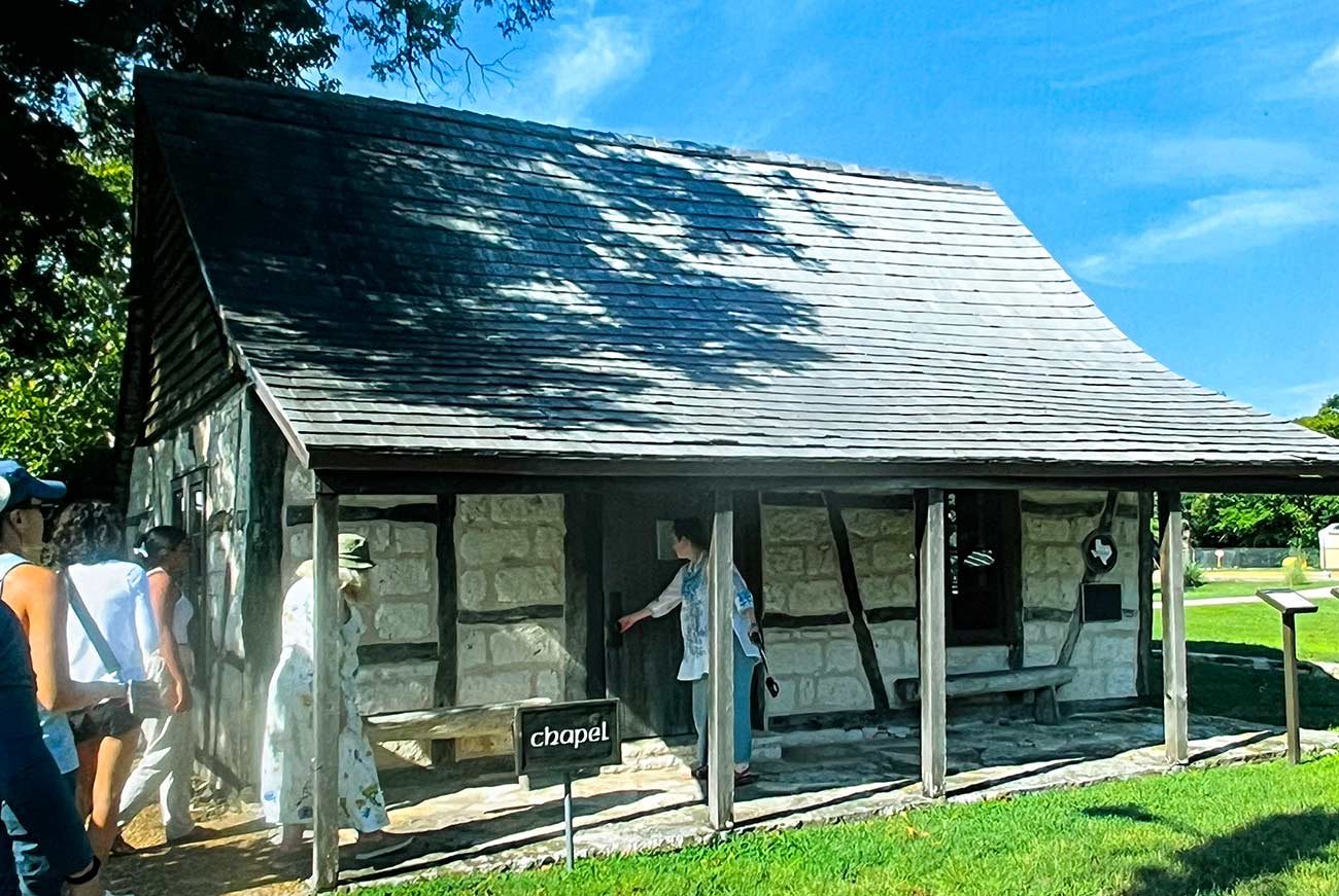 Pioneer Village featuring a chapel.