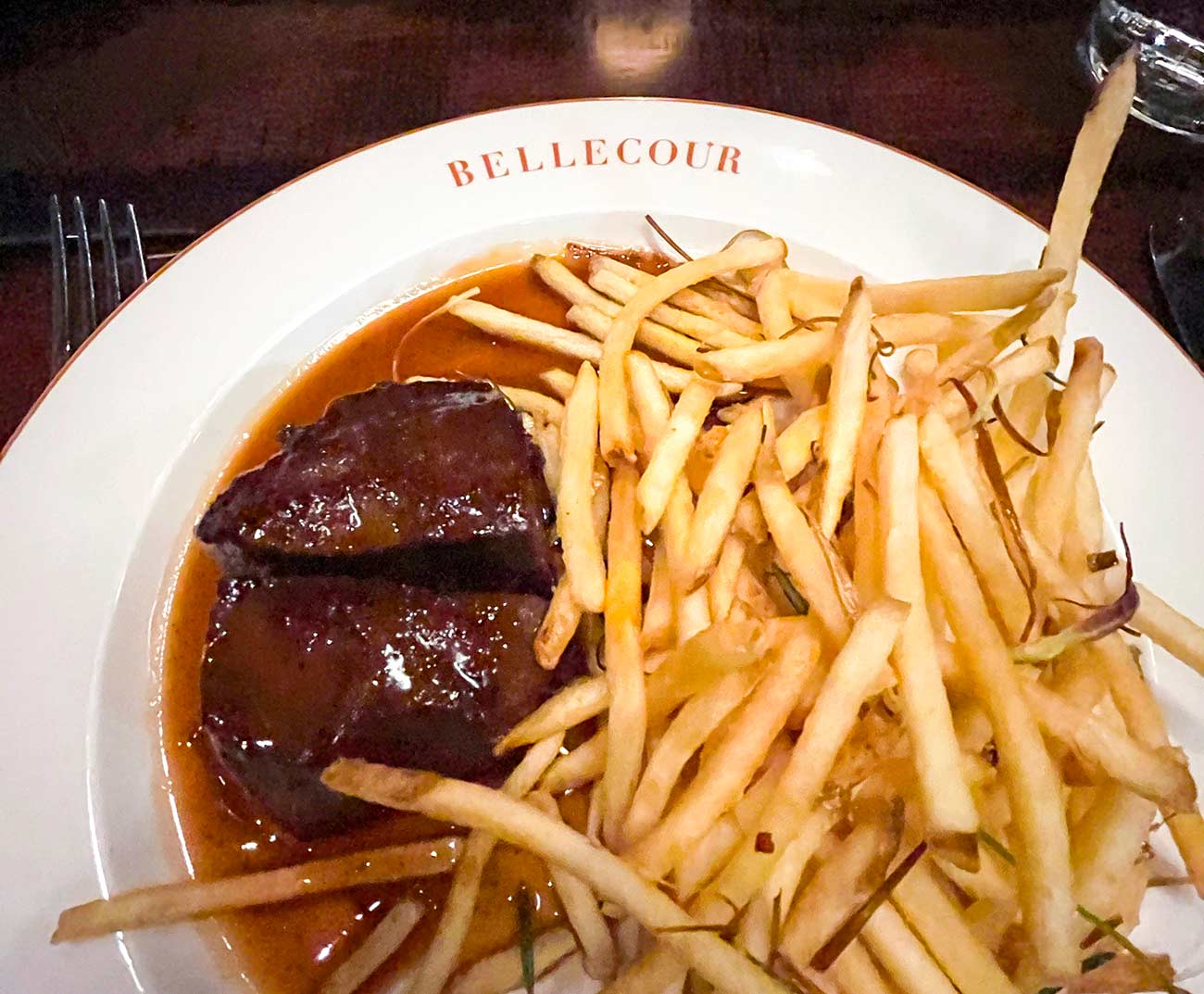 Steak Frites, steak and fries on a plate.
