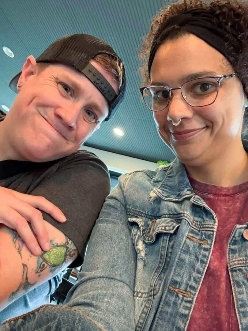 Female queer couple selfie photo.