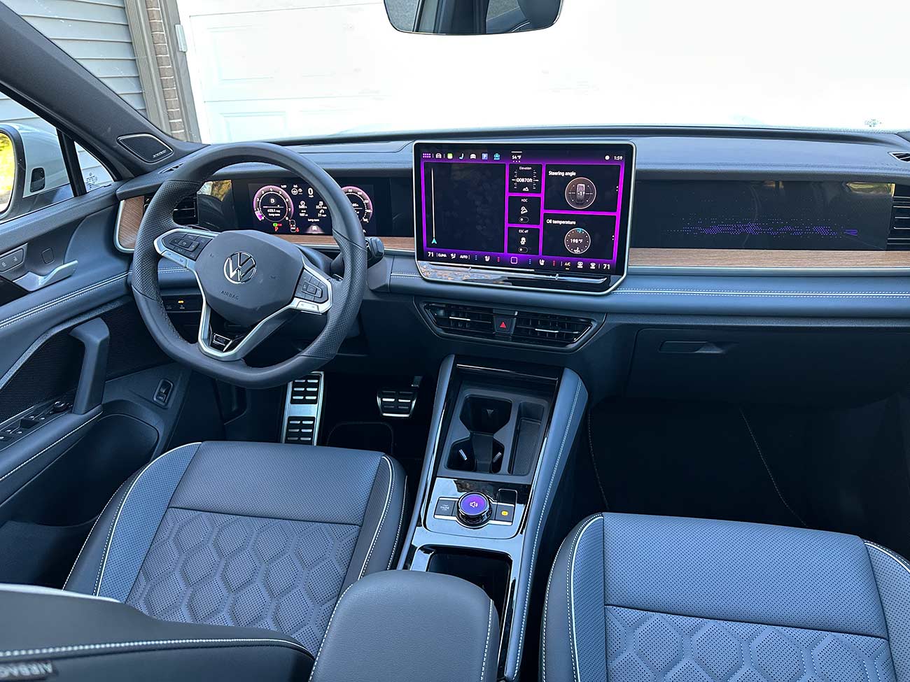 Interior shot of the 2026 Volkswagen Tiguan dashboard and console.