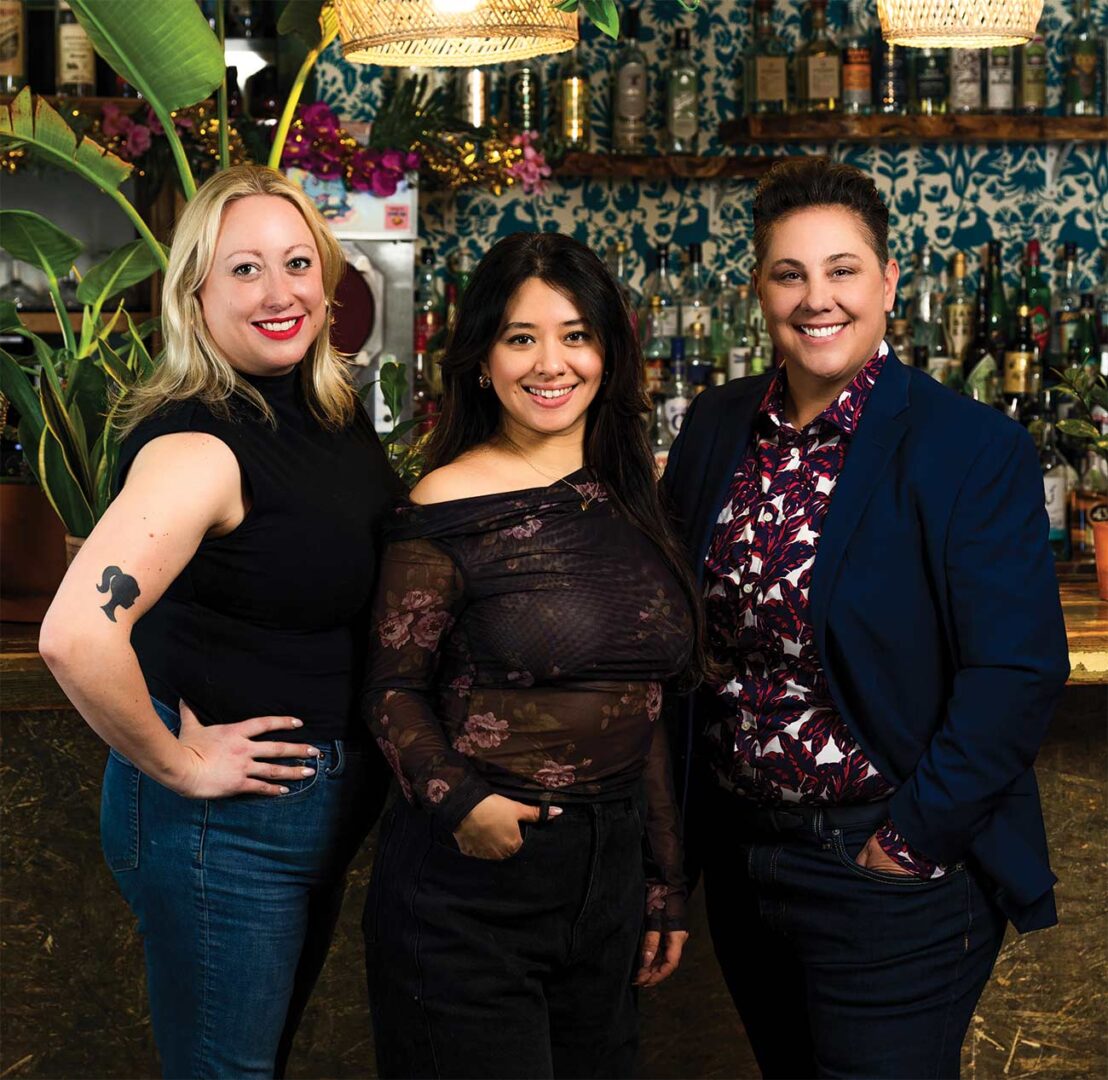 Ruby Scher, Naomi Rathke, and Janene Holig are three women that operate Hola Arepa restaurant.