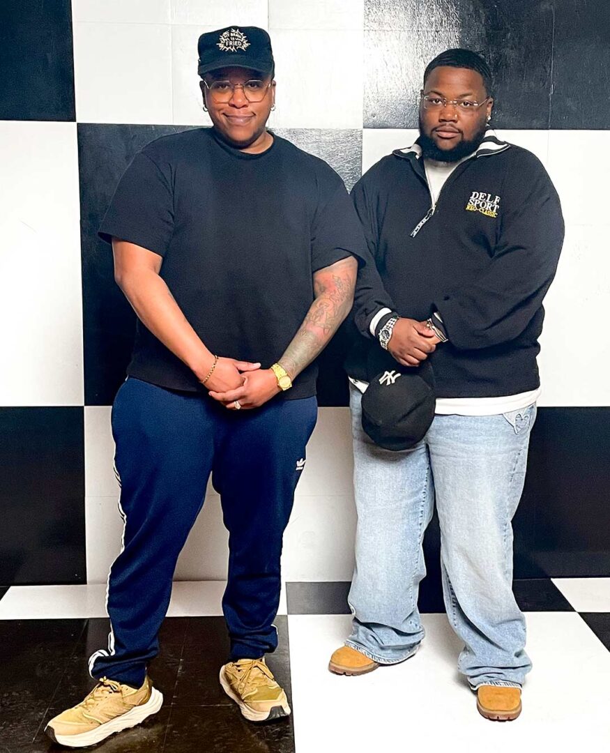 Artists Wordsworth Musinguzi and BEARBOI poses together.