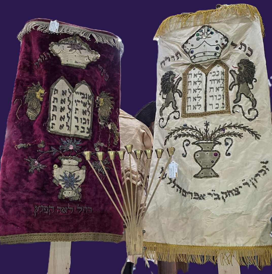 Two vintage Greek cloths one white and one purple.