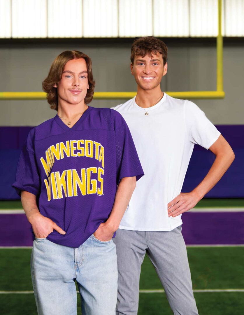 Minnesota Vikings Cheerleaders Blaize Shiek & Louie Conn pose together on the Vikings training field.