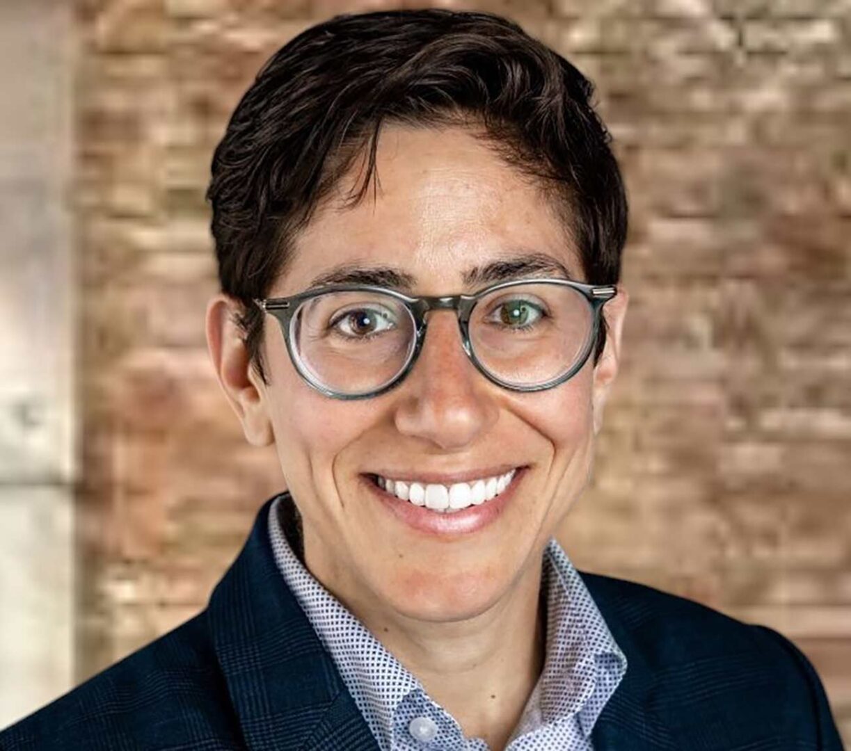 Headshot of Dr. Jillian Scheer smiling.