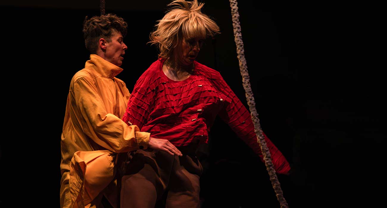 A Body (Un)Becoming dance performers in the middle of their dance routine.