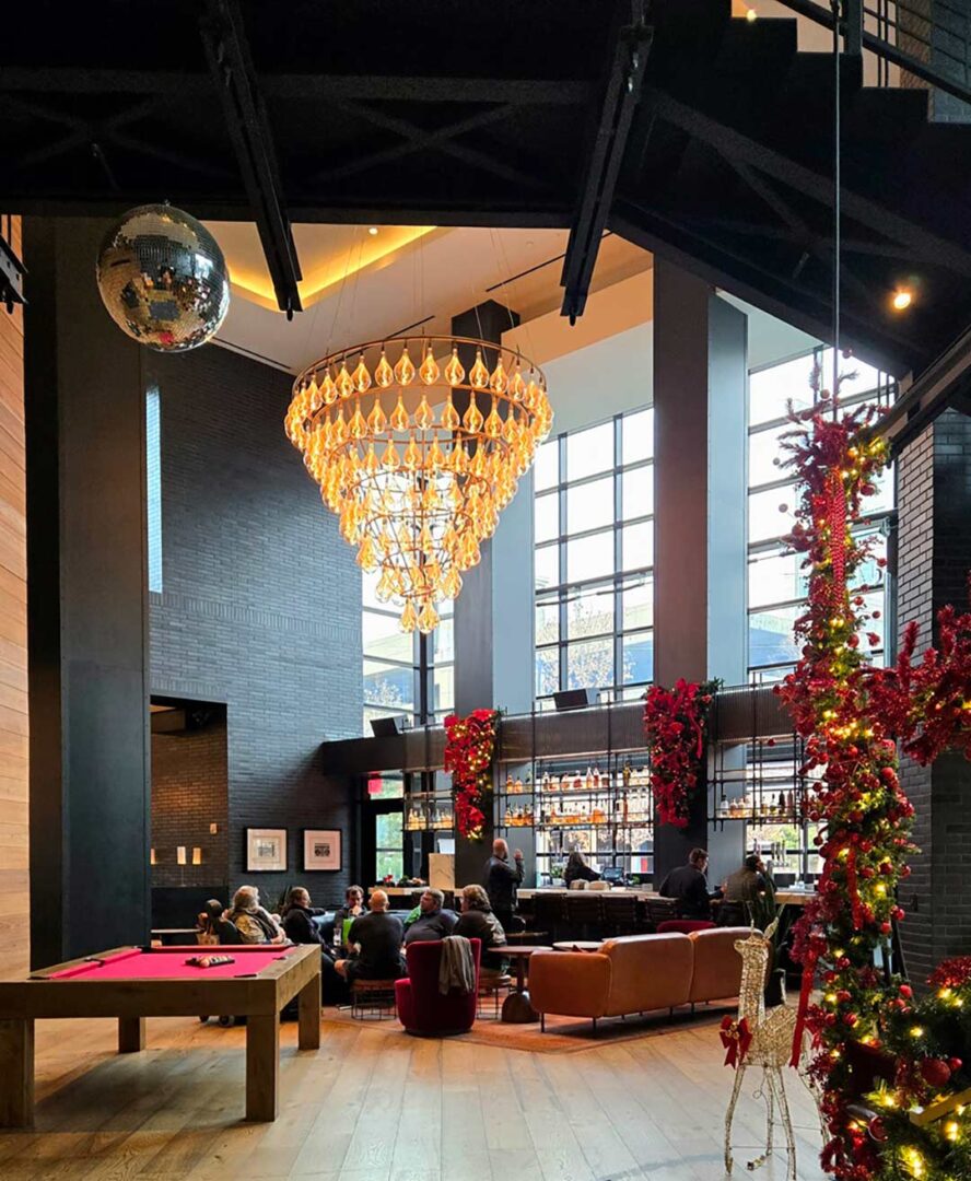 Lobby at the Virgin Hotels Nashville decorated for Christmas.