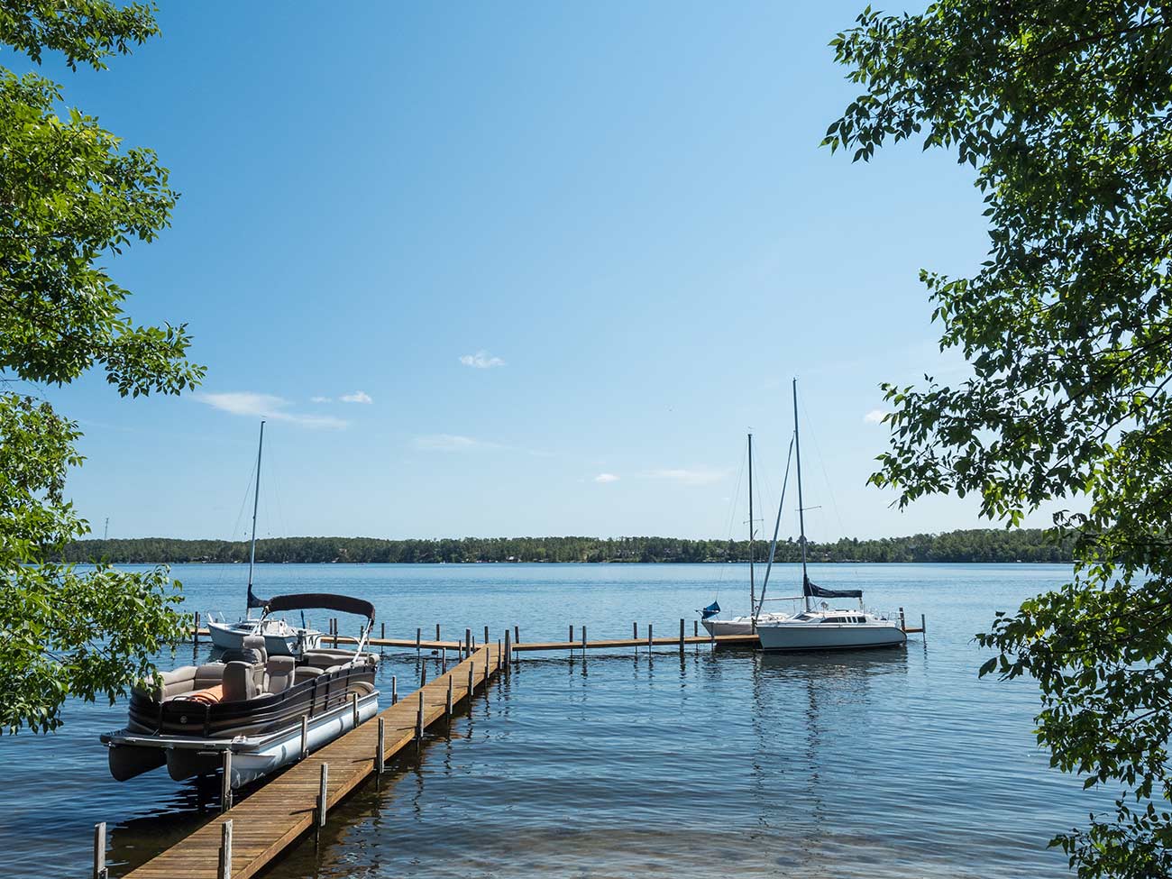 These are boats near the shore of East Gull Lake in Minnesota.