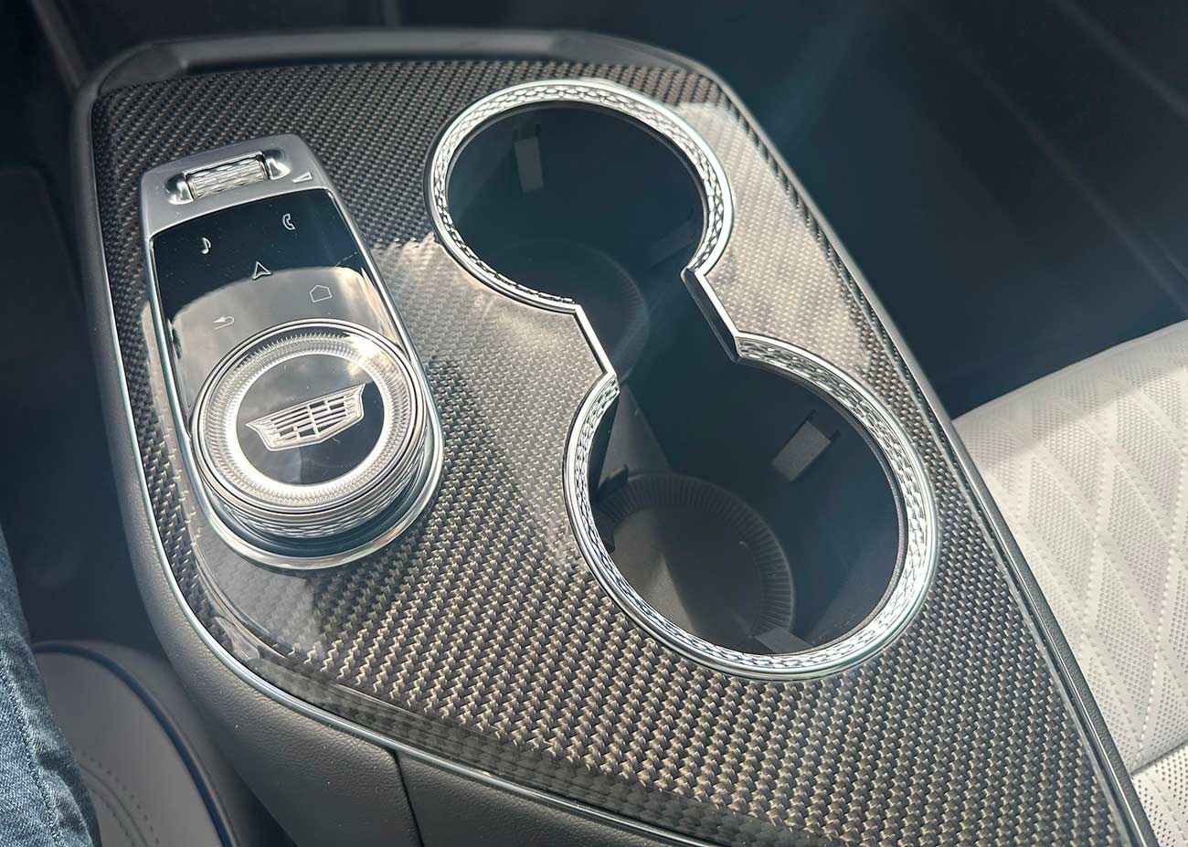 Close-up of the switchgear and cup holders in the 2026 Cadillac Optiq-V.
